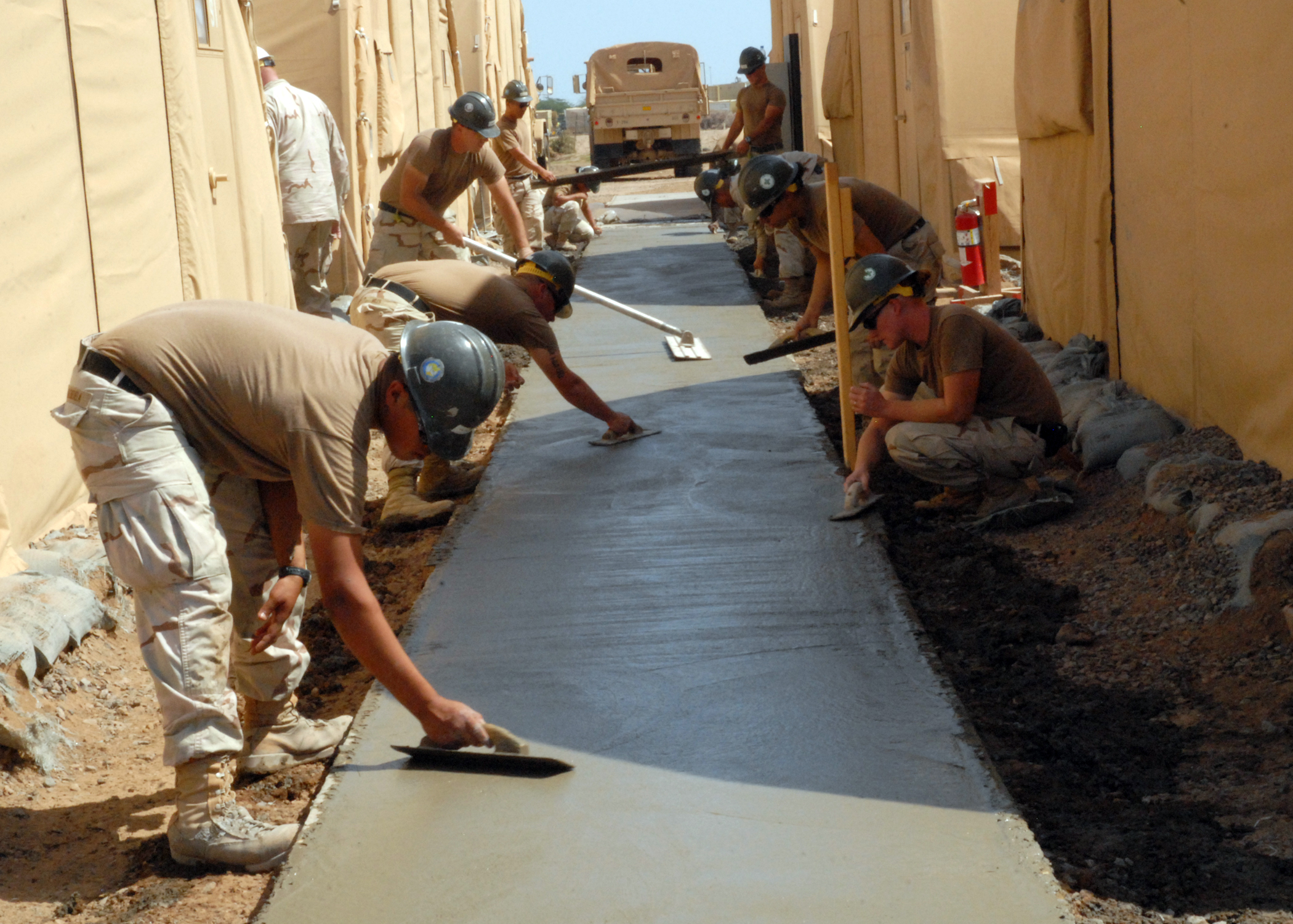 Fresh concrete sidewalk finishing